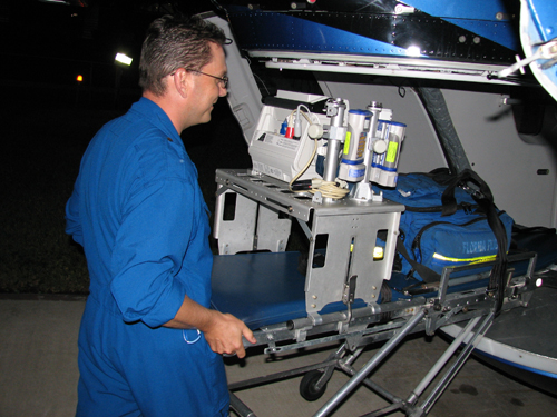 Figure 1. Inside the helicopter cabin, the flight crew is prepared with ambulatory pumps and monitors to help keep the patient stabilized during flight. All tools used in the helicopter must be durable and adaptable to withstand the moving environment and must be compact and lightweight to fit within space constraints. Courtesy of Ryan Dale